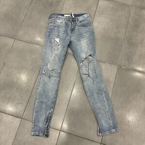 Light blue skinny ripped jeans